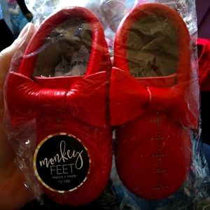 Red "football season" moccasins